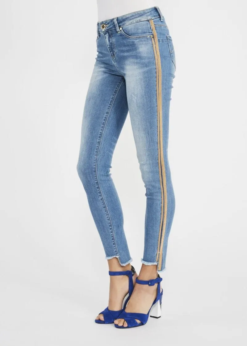 Jeans jeggings con banda dorata
