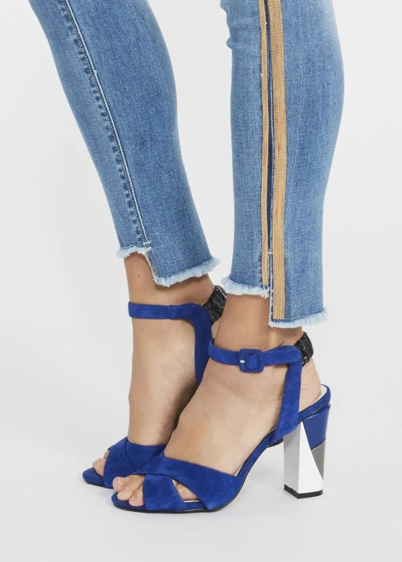Jeans jeggings con banda dorata