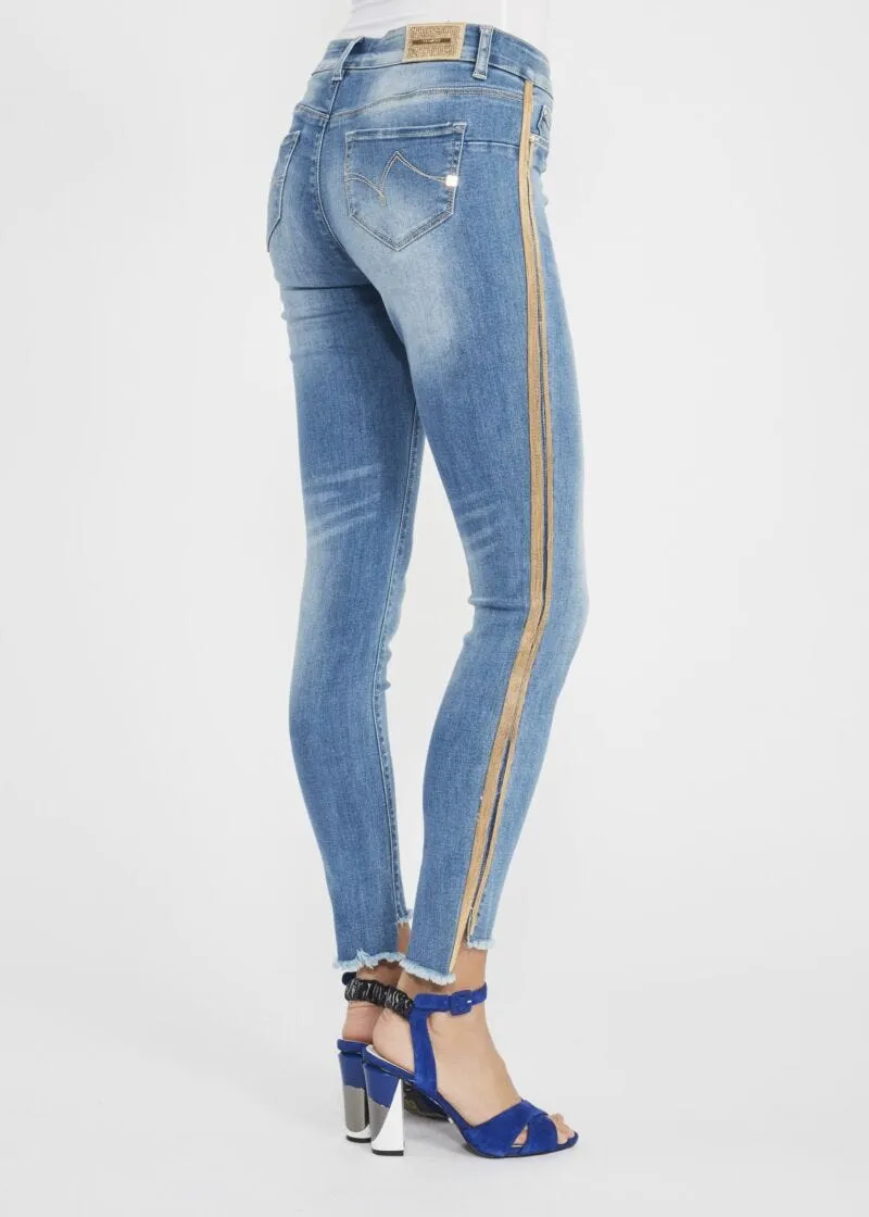 Jeans jeggings con banda dorata