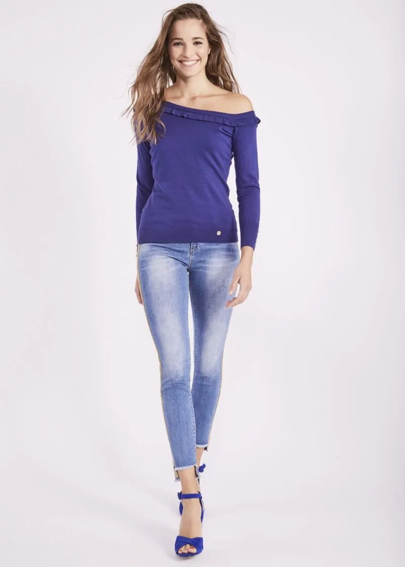 Jeans jeggings con banda dorata