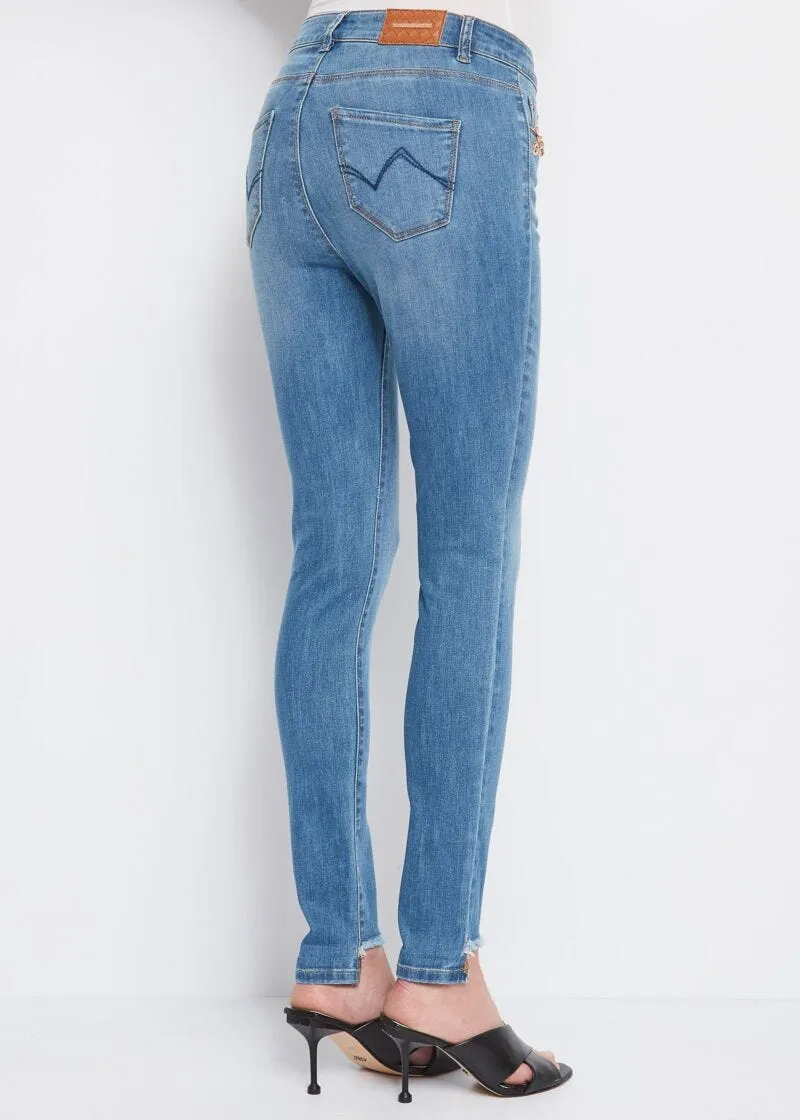 Jeans skinny con catena