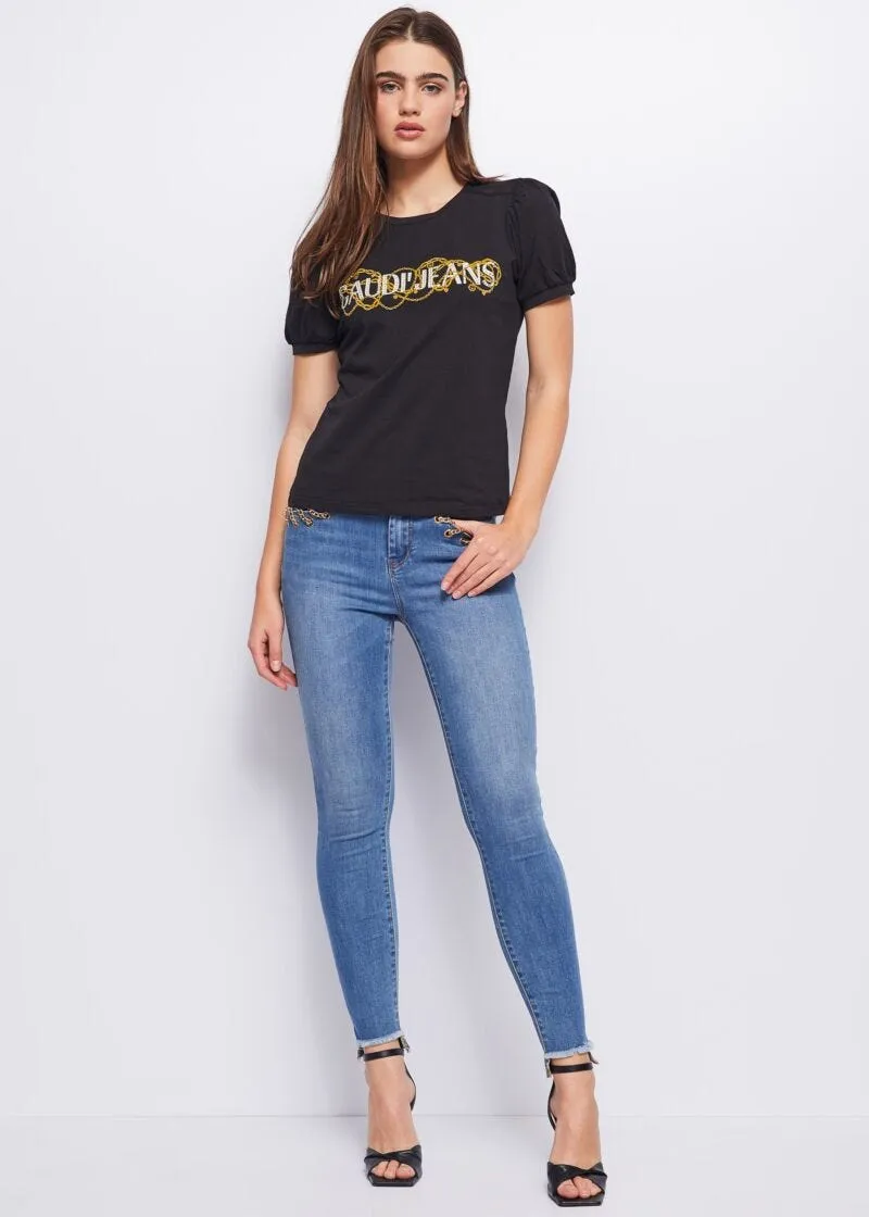Jeans skinny con catena